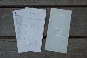 User manuals and Apple logo stickers