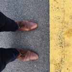Brown leather shoes worn by the photographer